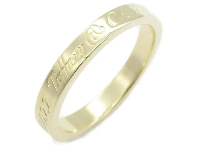 Anillo Estrecho Tiffany & Co. Notes Dorado 