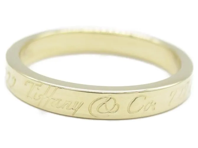 Anillo Estrecho Tiffany & Co. Notes Dorado 