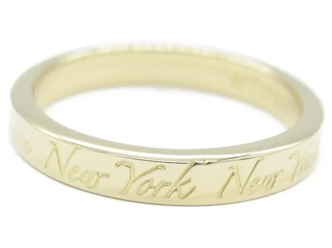 Anillo Estrecho Tiffany & Co. Notes Dorado 