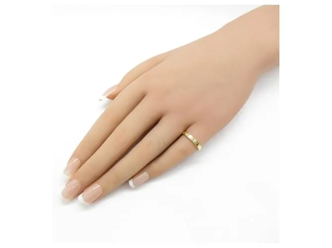 Anillo Estrecho Tiffany & Co. Notes Dorado 