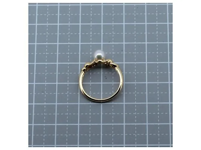 Anillo Tasaki K18YG con perla y diamante tamaño 12 en excelente estado Dorado 
