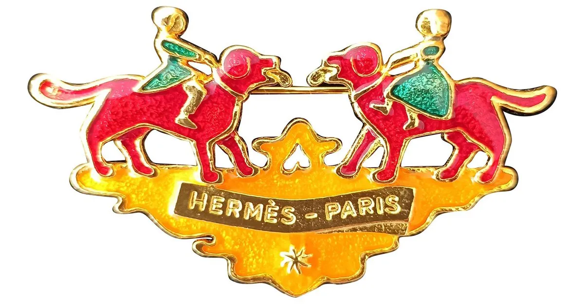 Hermès Alfileres y broches Dorado 
