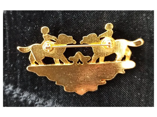 Hermès Alfileres y broches Dorado 