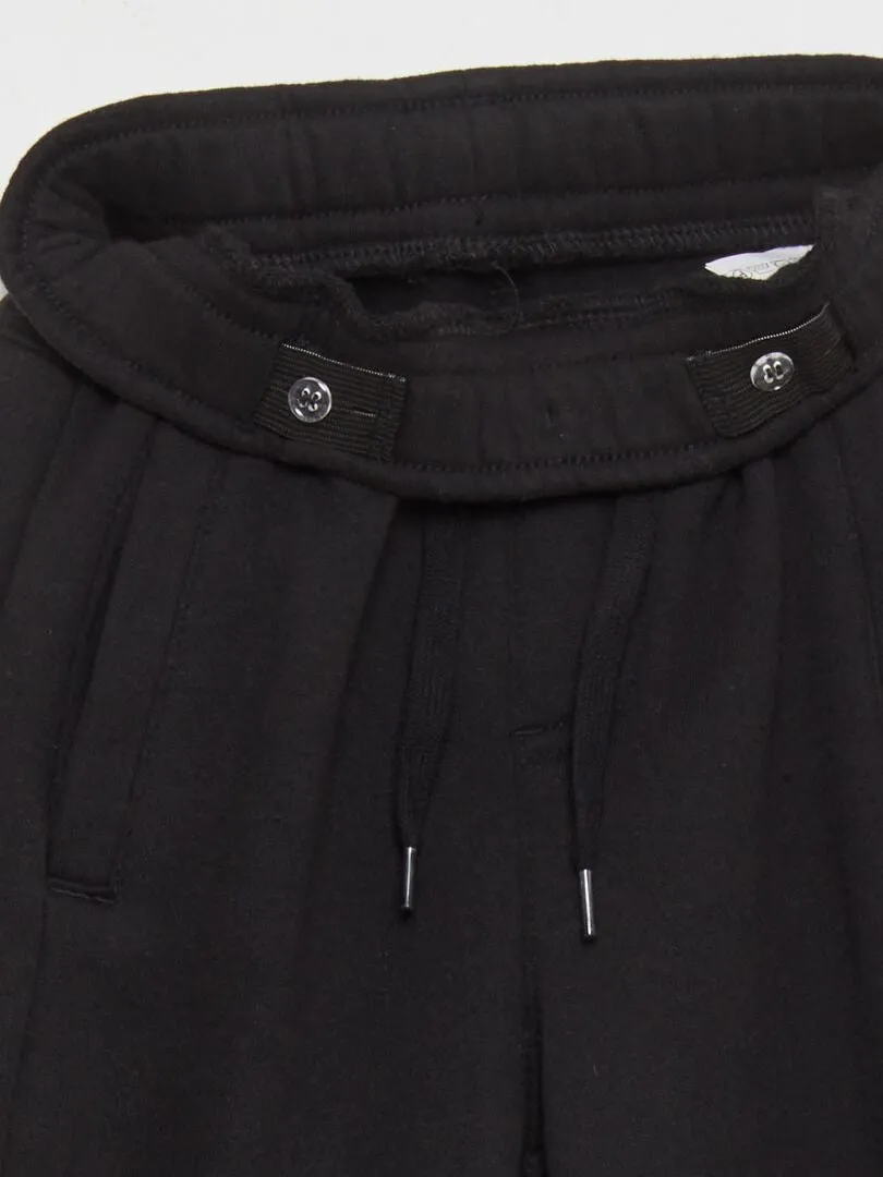 PANTALóN DE CHáNDAL TIPO JOGGING  CORTE MáS AJUSTADO  NEGRO