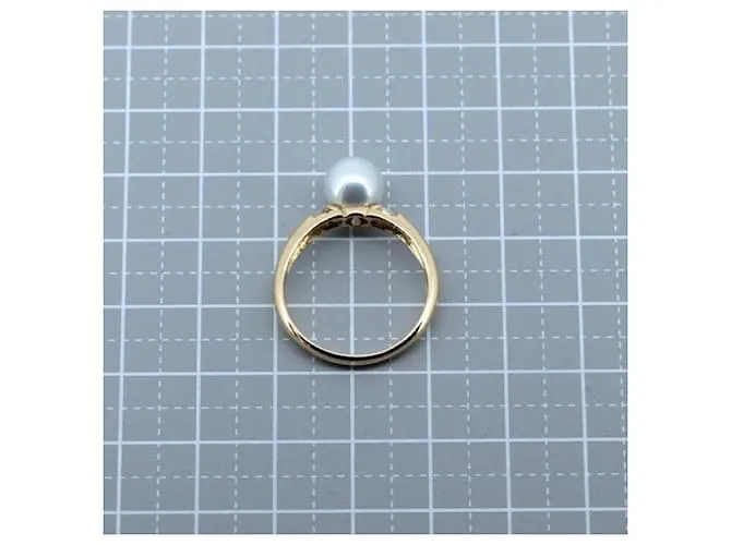 Tasaki 18Anillo de perlas con solitario K en excelentes condiciones Dorado 