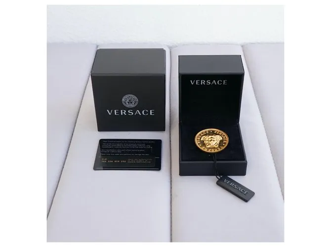 Versace Alfileres y broches Dorado 