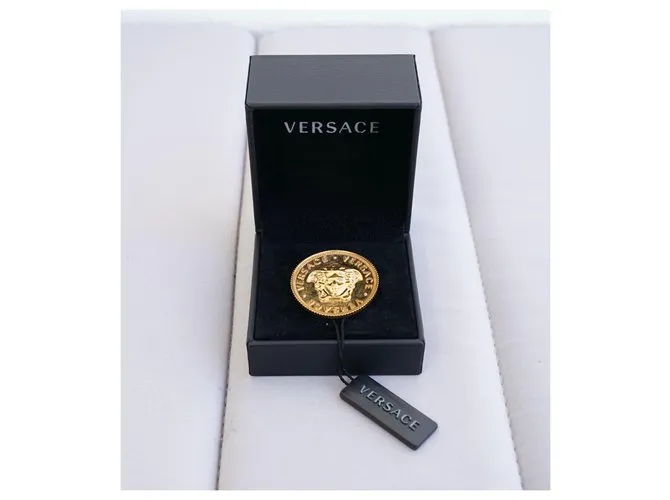 Versace Alfileres y broches Dorado 
